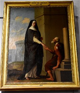Soeur carmelite donnant l’aumone