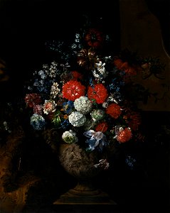 Still life of flowers on a stone plinth