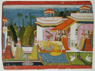 Thakur reclining on a couch surrounded by women and attendants (6125108346)