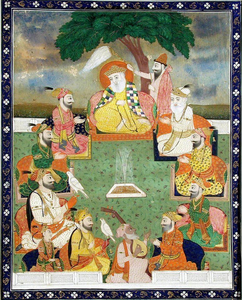 The nine Sikh gurus seated in a circle under a tree (6124596945)