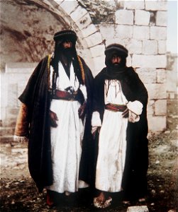 TWO ARAB MEN IN JERUSALEM IN TRADITIONAL GARB PHOTOGRAPHED IN THE LATE 19TH CENTURY BY FRENCH PHOTOG