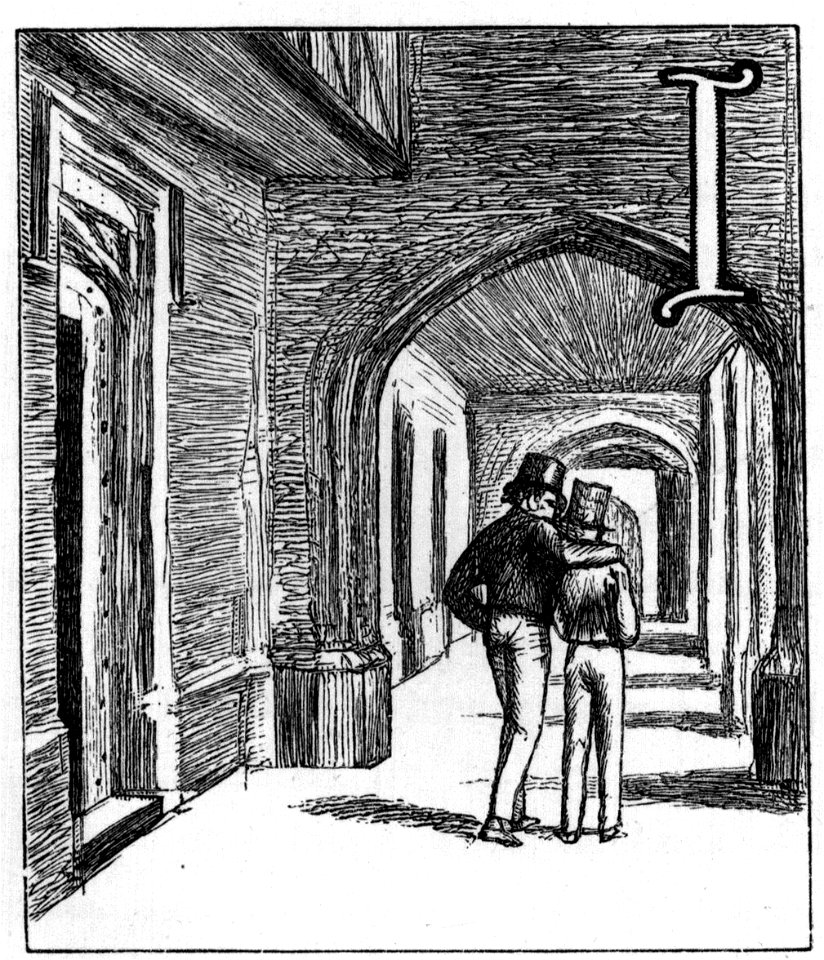 Two boys walking down hallway