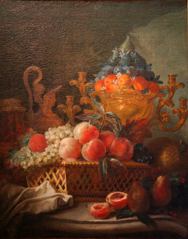Vase et corbeille de fruits