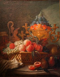 Vase et corbeille de fruits