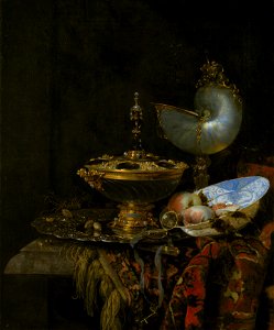 Willem Kalf - Pronk Still Life with Holbein Bowl, Nautilus Cup, Glass Goblet and Fruit Dish - Google Art Project