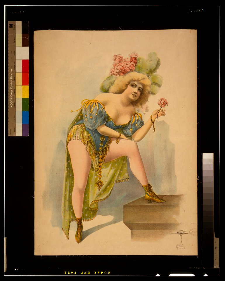 Woman wearing low cut green, blue, and yellow costume with feathers and roses in her hair LCCN2014635680