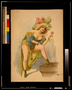 Woman wearing low cut green, blue, and yellow costume with feathers and roses in her hair LCCN2014635680