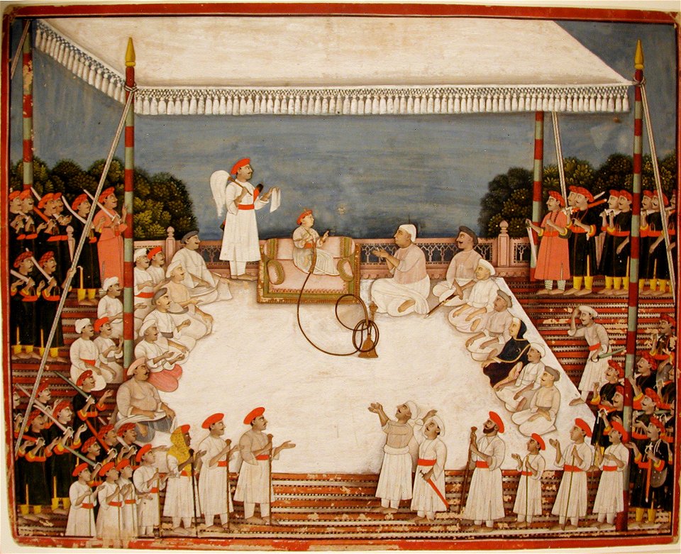 Young prince in durbar, smoking a hookah (6125142006)