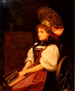 Frau am Spinnrad mit Goldhaube