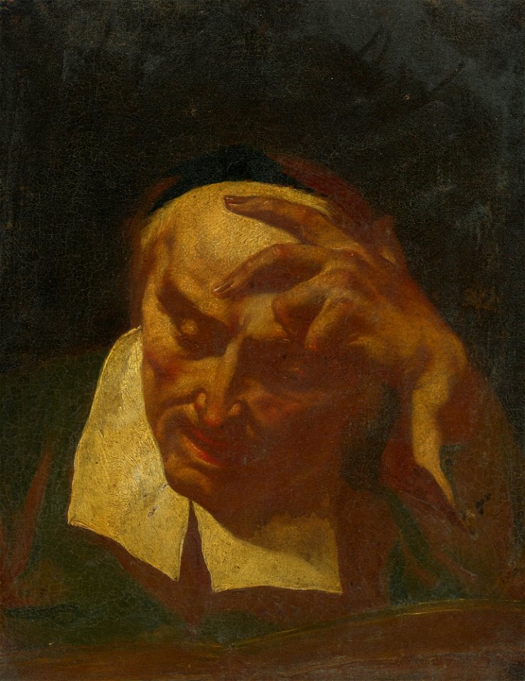 Head study of an elderly man reading