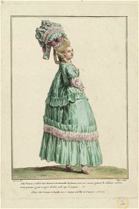 Jolie Femme coëffée dun Bonnet à la Nouvelle Paysanne