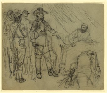 Officer pointing to man in bed in a tent LCCN2004660645