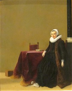'Portrait of a Woman with a Dog', oil on wood painting by Hendrick Gerritsz. Pot, c. 1635. Free illustration for personal and commercial use.