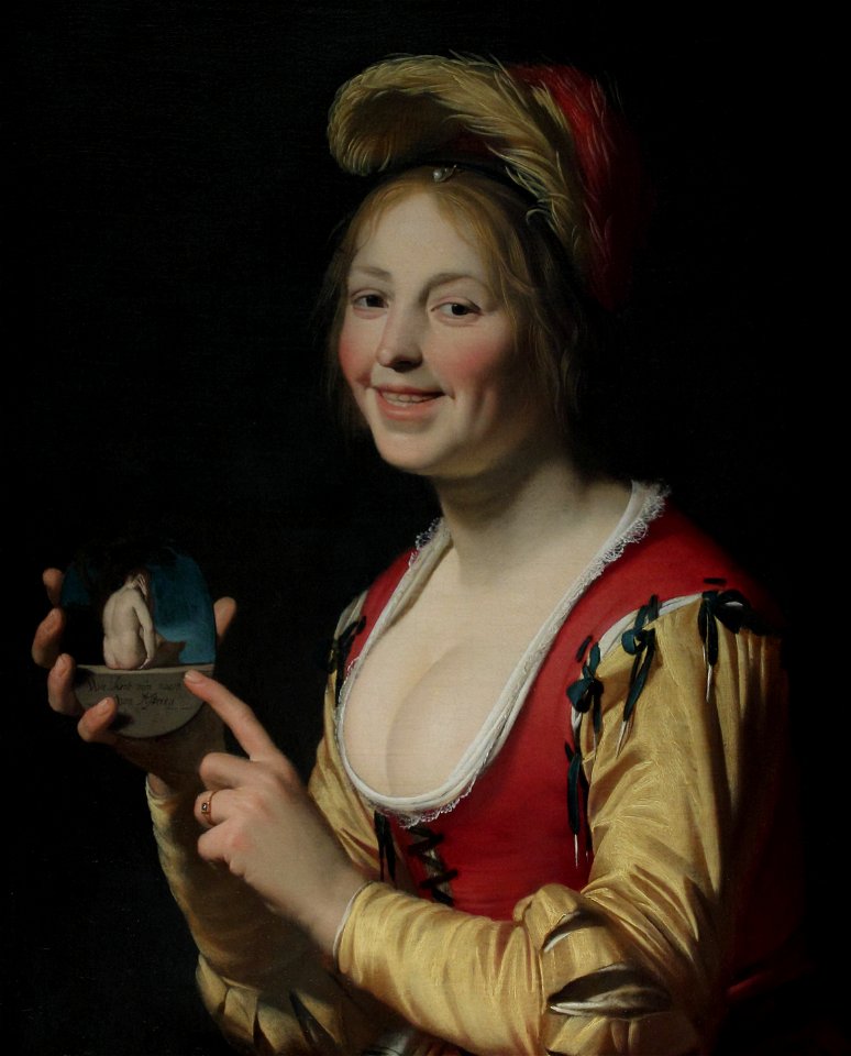 Femme montrant un objet obscène