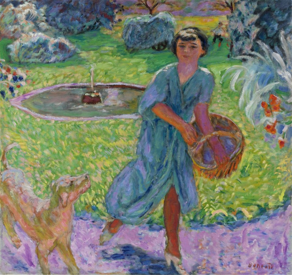 JEUNE FILLE JOUANT AVEC UN CHIEN