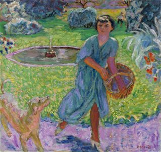 JEUNE FILLE JOUANT AVEC UN CHIEN