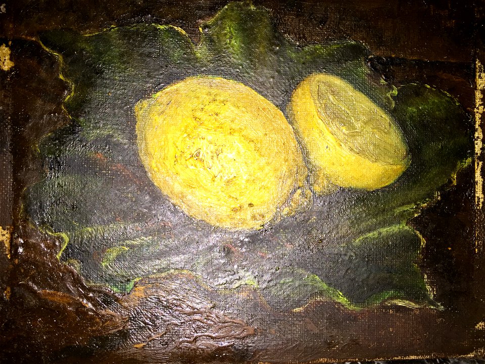 Lemon and a half on leaf