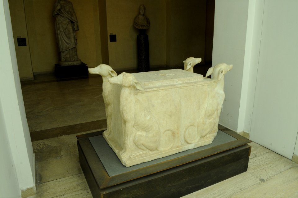 Roman water font or base, with greyhounds