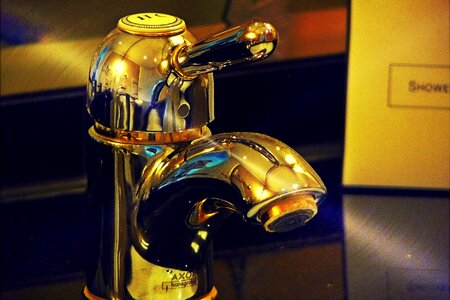 Metal mixer tap wash photo
