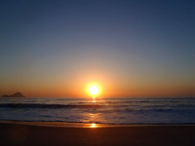 Sunset mar beach photo