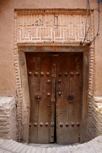 Dřevěnné doors mud house iran photo