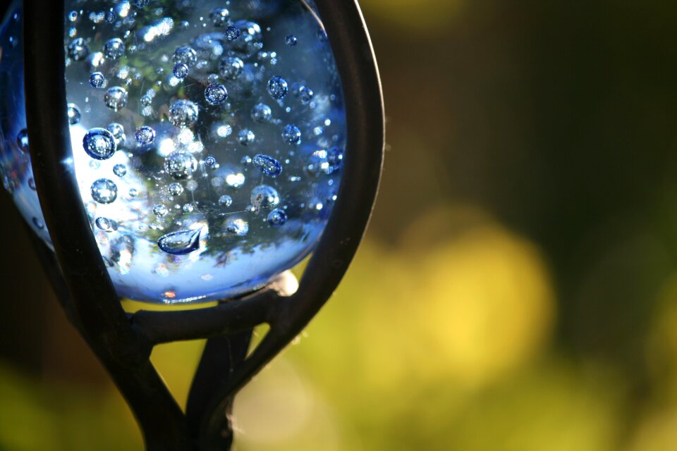 Glass ball blue air bubbles