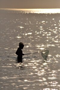 Fishing water sunset