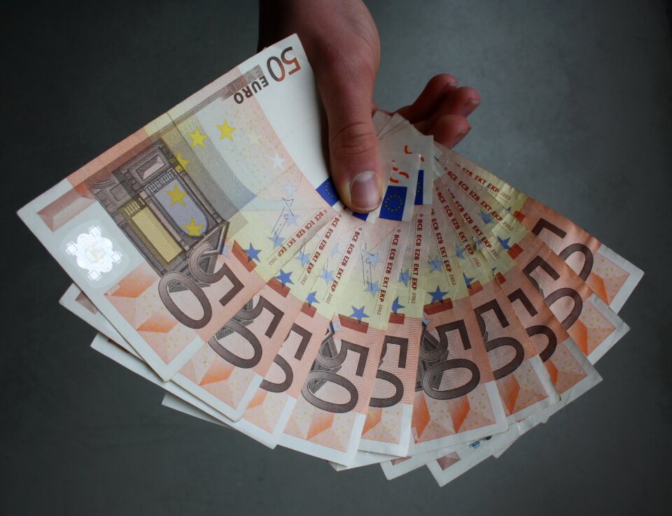 Holding money notes