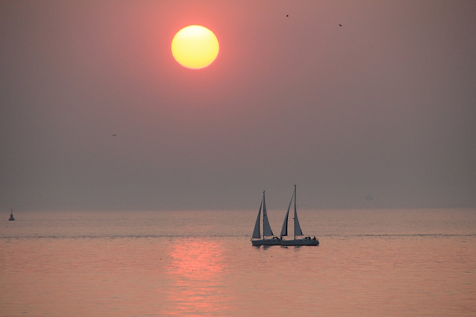 Sunset sun and sea evening mood at the lake