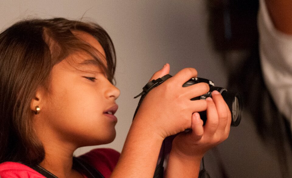 Camera young taking