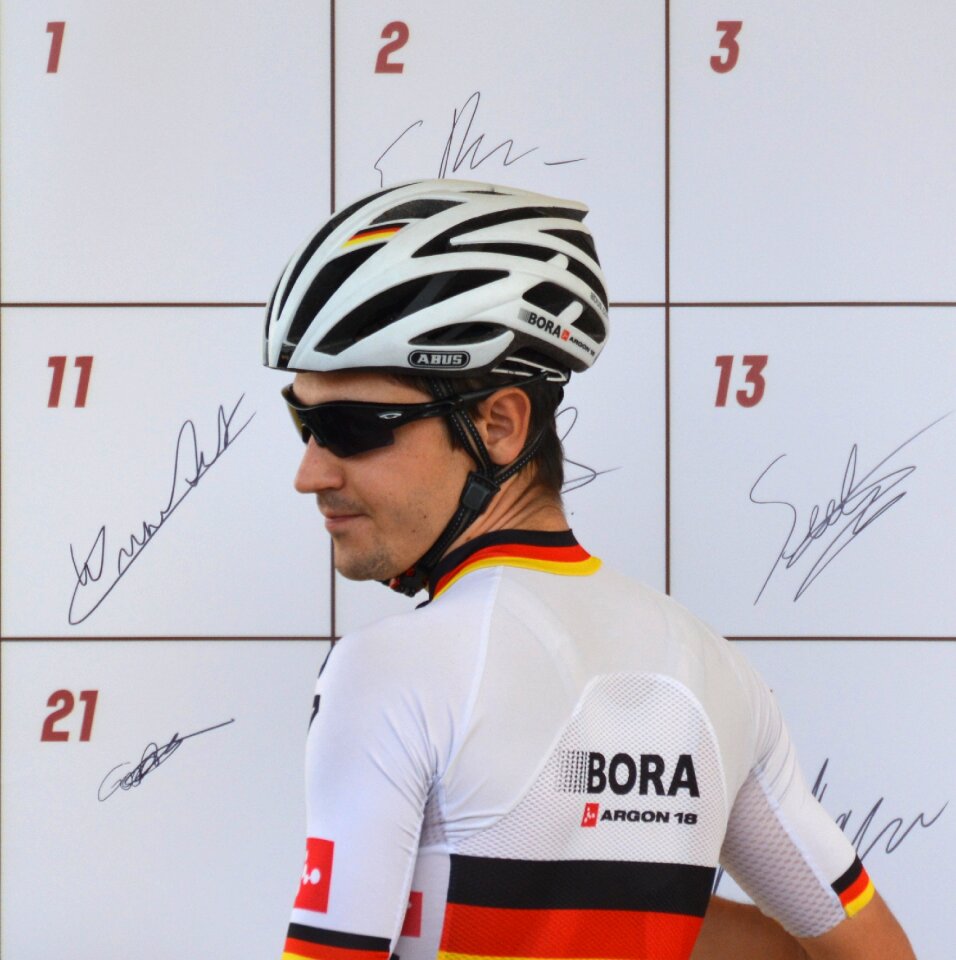 Professional road bicycle racer man people