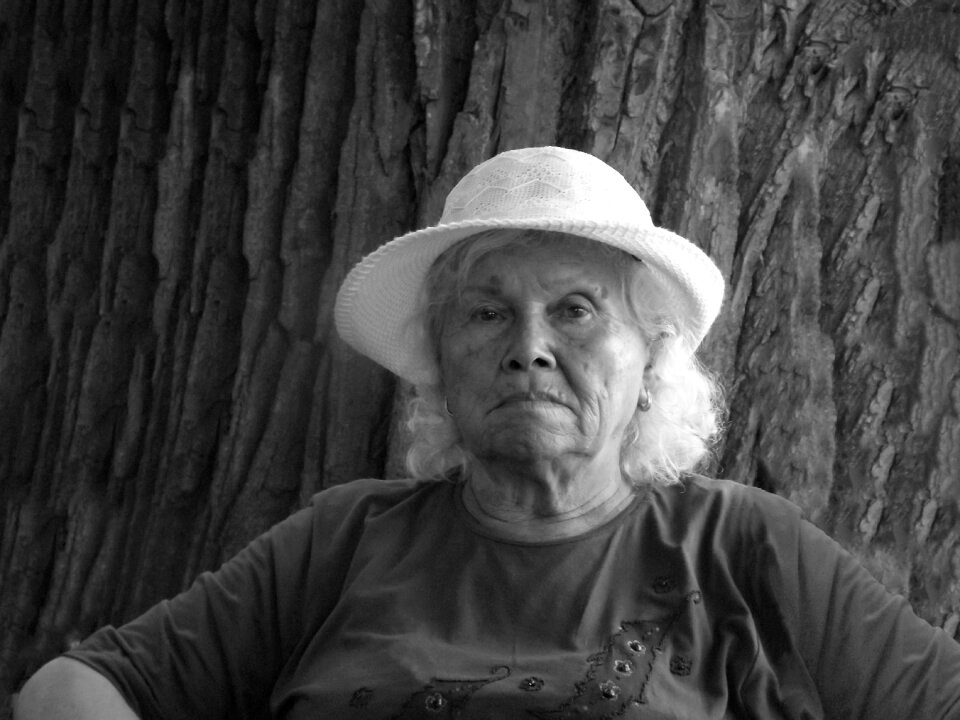 Tired black and white grandmother