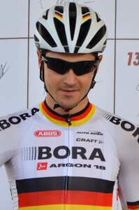 Professional road bicycle racer man people