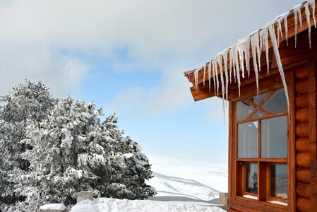 Summit ice wooden house photo