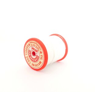 White wire couture sewing thread photo