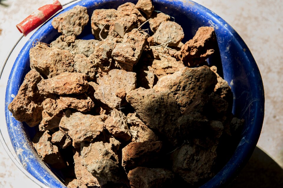 Red earth bucket rock