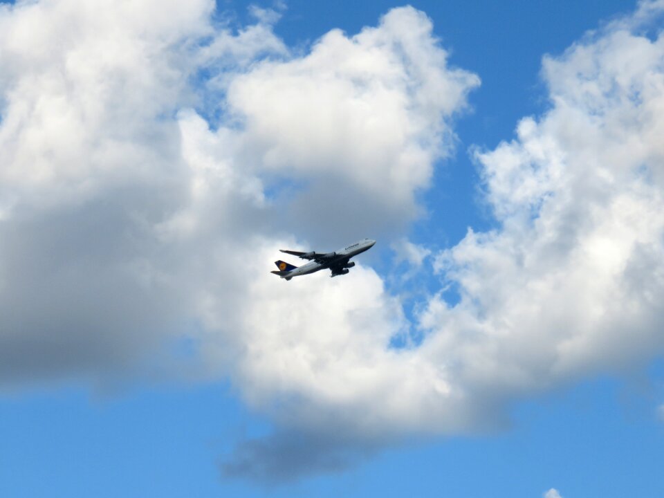 Take-off passenger jet clouds