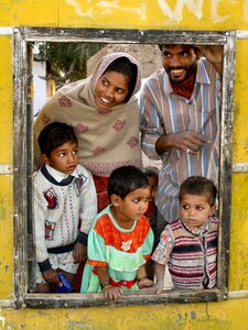 Curious children family portrait photo