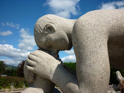 Stone figure pair tender