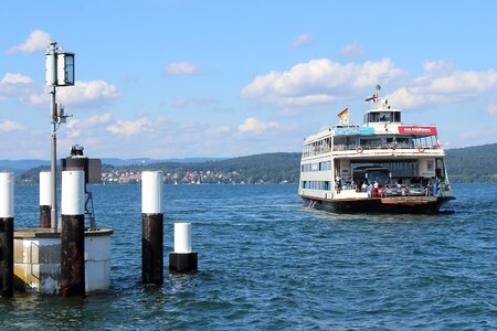 Water car ferry clouds
