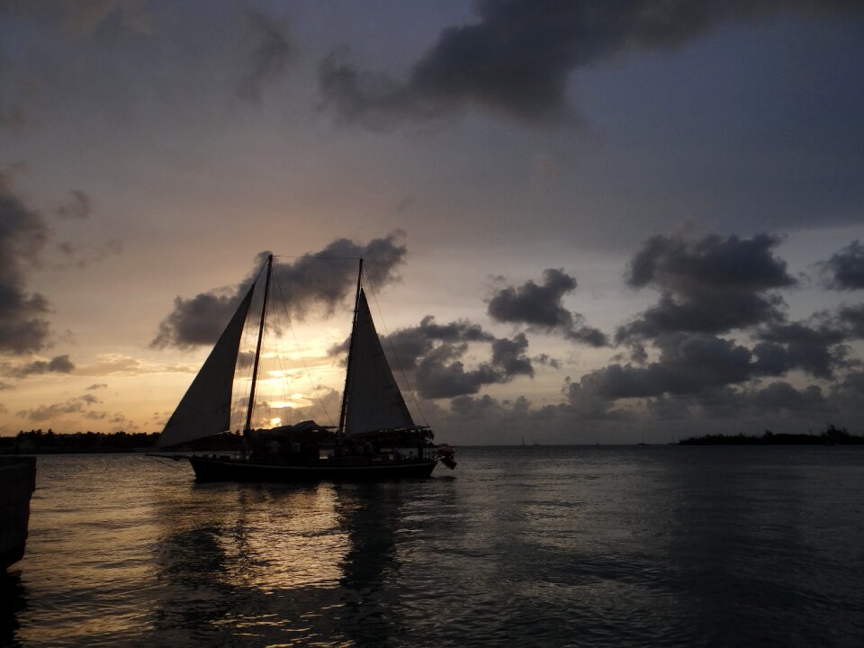 Ship sunset clouds sailing boat