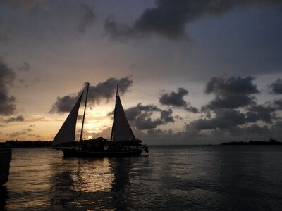 Ship sunset clouds sailing boat