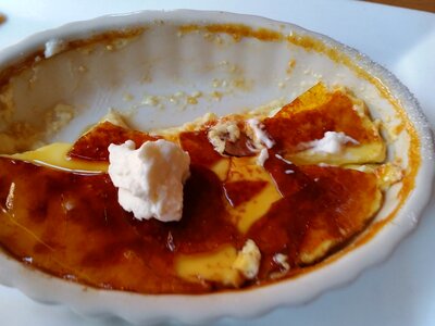 Custard dessert whipped cream burnt sugar photo