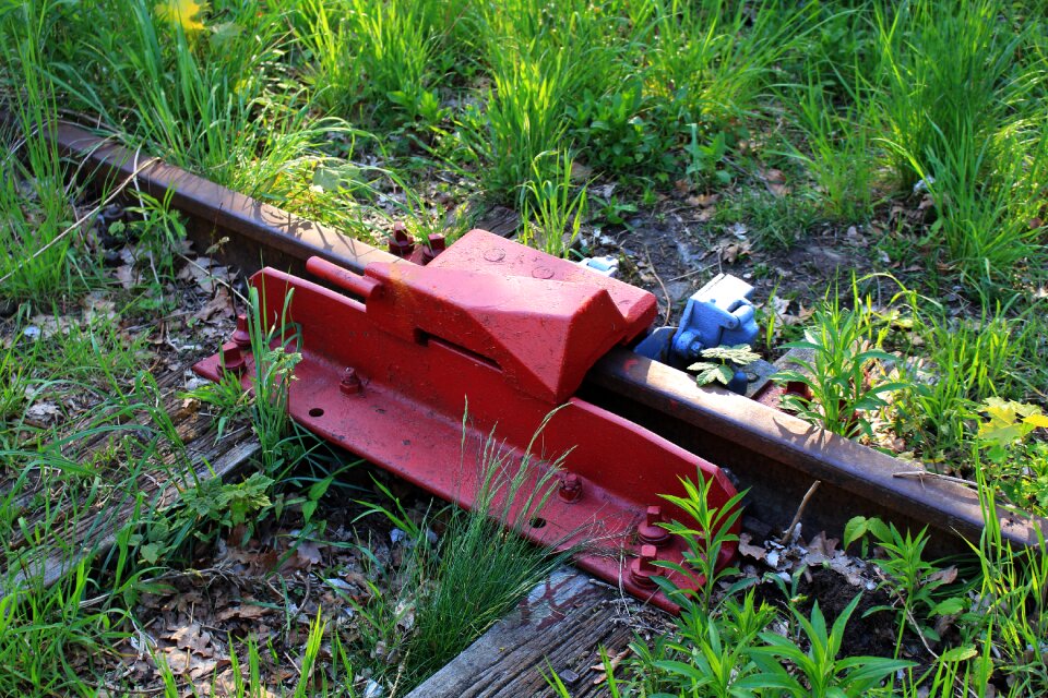 Railway stop track lock