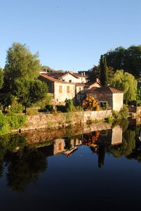 Houses on water dordogne river photo