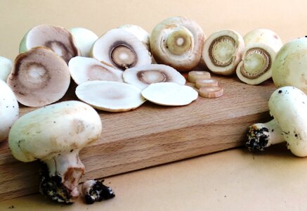 Mushrooms button mushrooms cutting