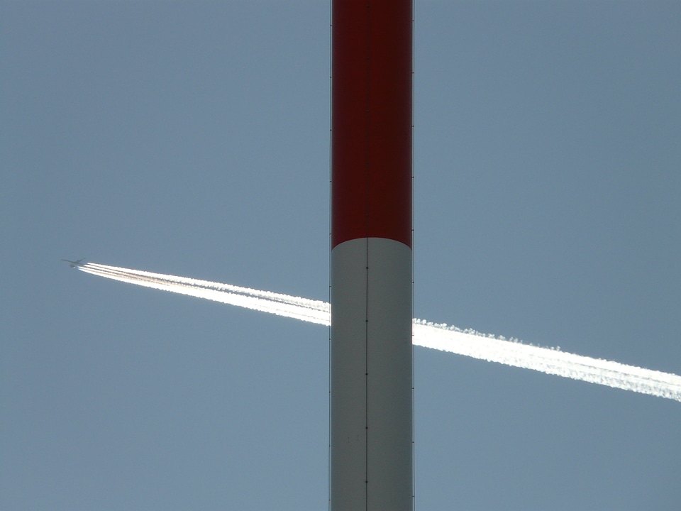 Transmission tower aircraft contrail