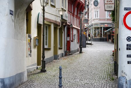 Alley cobblestones old houses