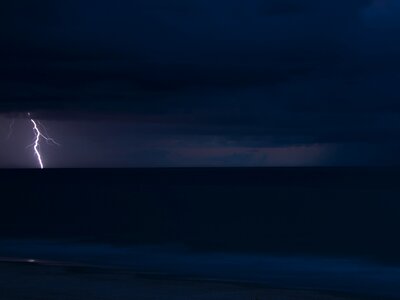 Clouds rain sea photo