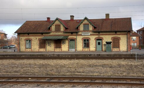 Railway brick building rails photo